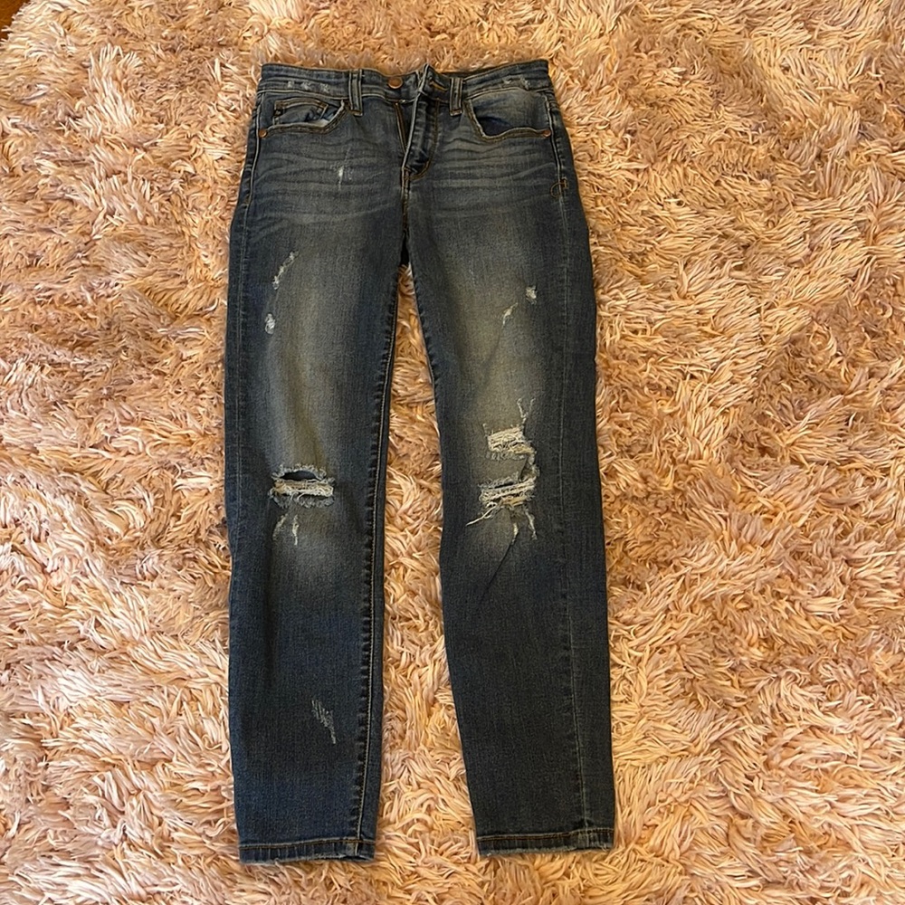 dark blue ripped jeans